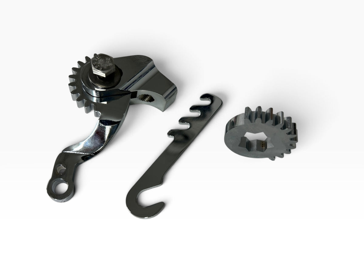 Pangea Speed Brake Crossover gears, linkage arm and spring anchor on a white background