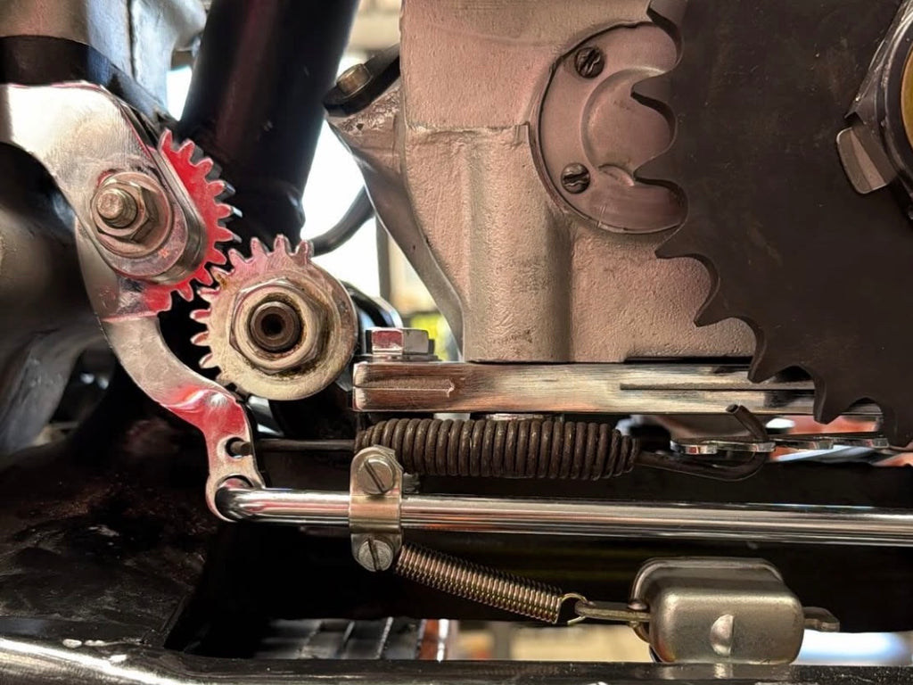 Pangea Speed brake crossover gears installed on a vintage Harley-Davidson mechanical brake linkage