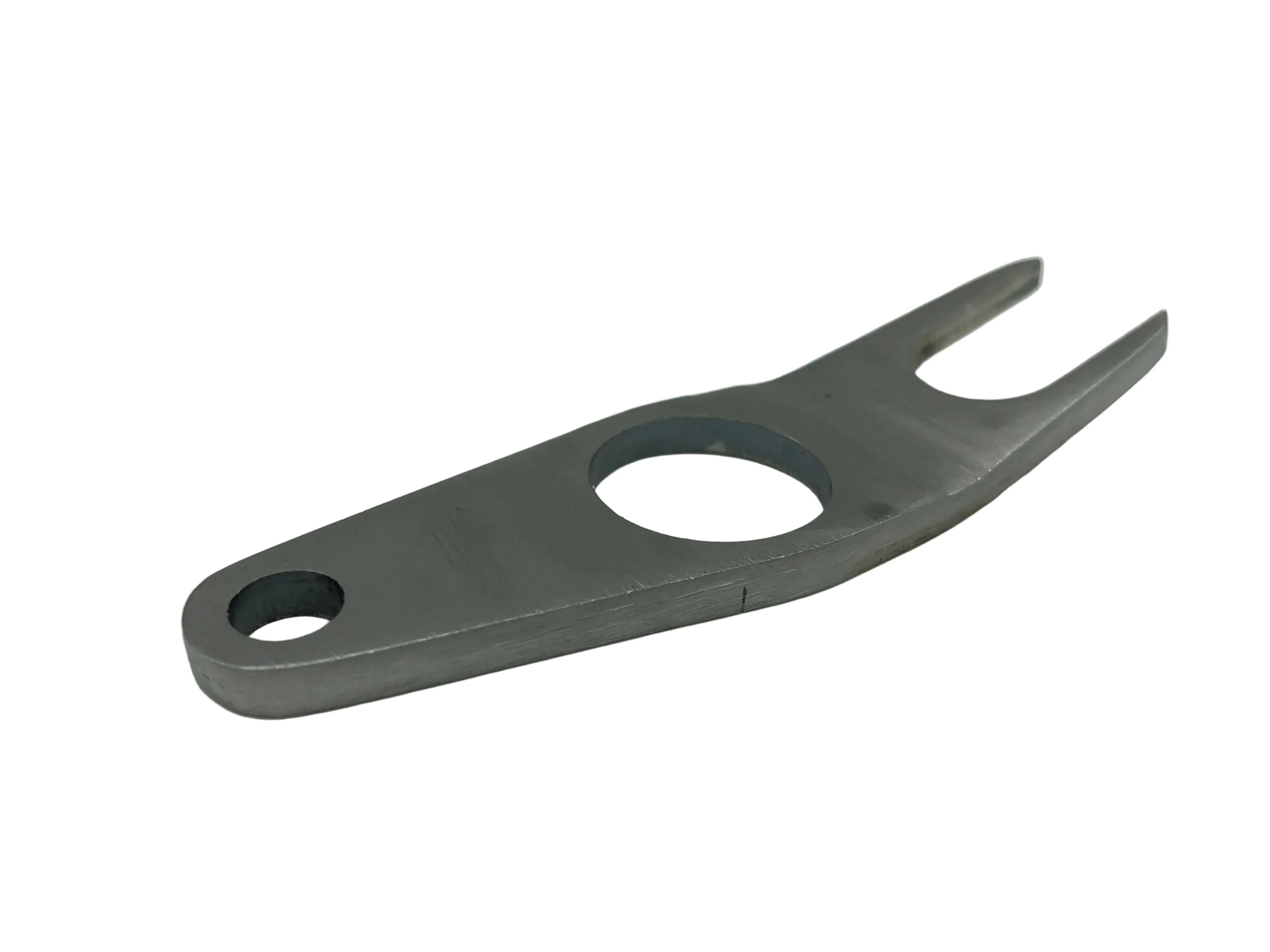 A gray steel jockey shift plate for a vehicle's transmission system.