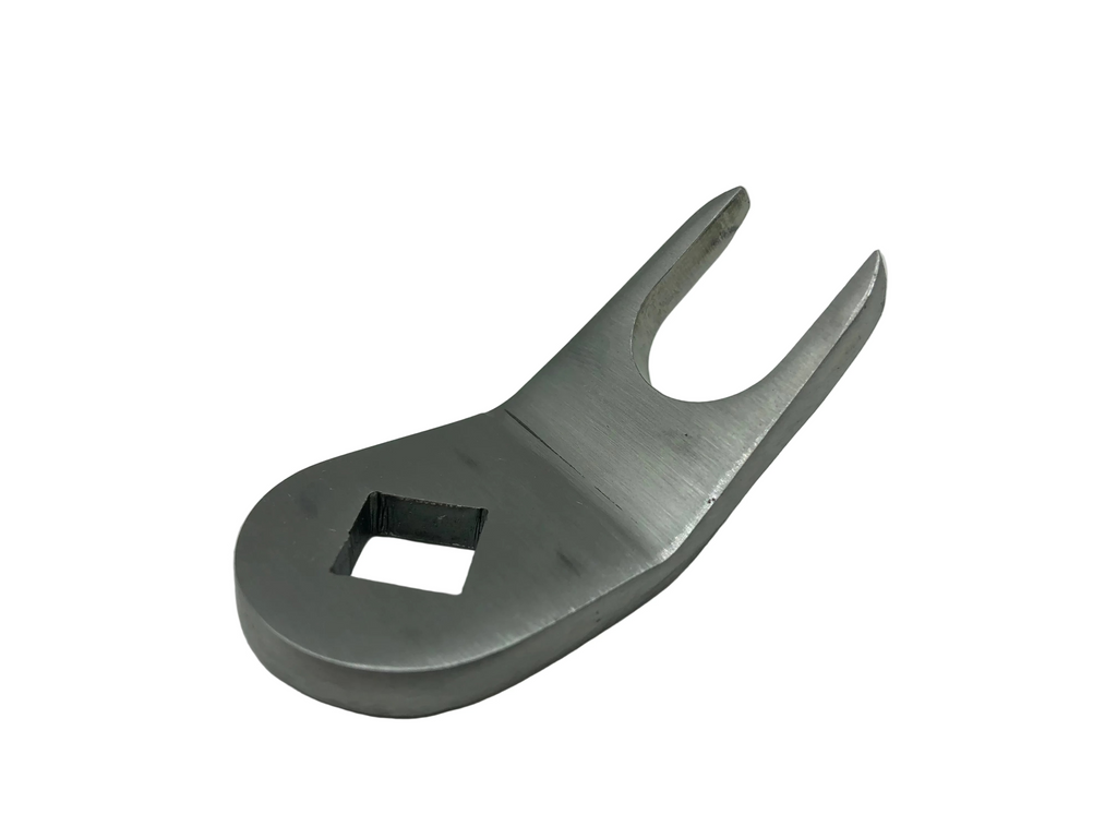 A silver-colored metal shifter plate with a keyway slot, designed for use with a rotary top transmission.